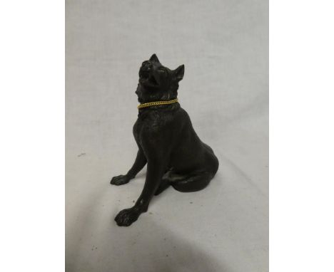 An old bronze figure of a seated dog, 4½" high