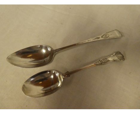 A George III silver bright cut serving spoon, Exeter marks 1796 and a silver "Queens" pattern dessert spoon, Sheffield marks 