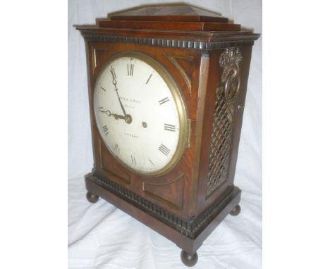 A Regency bracket clock by Yonge &amp; Son, Strand, London with circular dial in brass mounted mahogany rectangular case, 14"