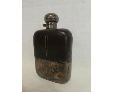 A large silver plated and leather mounted glass hip flask with hinged lid, 8" high