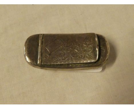 A George V silver shaped-rectangular snuff box with hinged lid and engraved decoration, Birmingham marks 1928