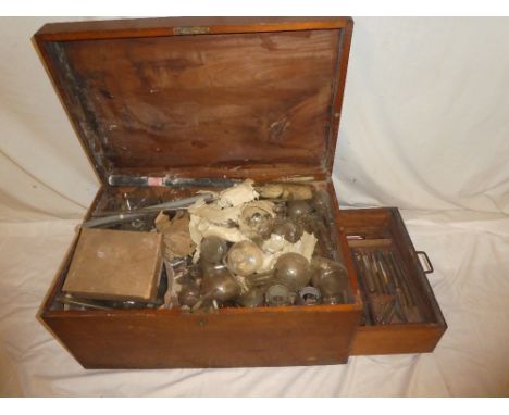 An old rectangular fitted wooden trunk containing a selection of various chemistry glass, the fitted base drawer with numerou
