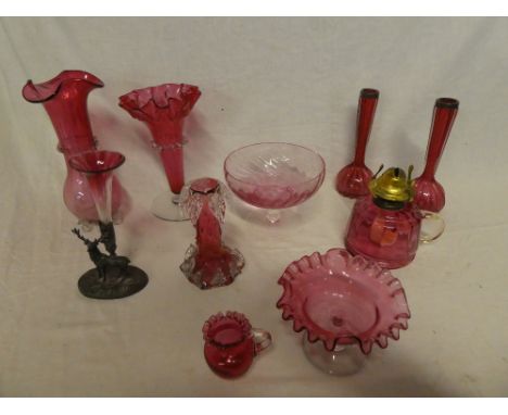 A selection of cranberry tinted glassware including tapered vases, pair of silver topped spill vases, pedestal bowl, small sp