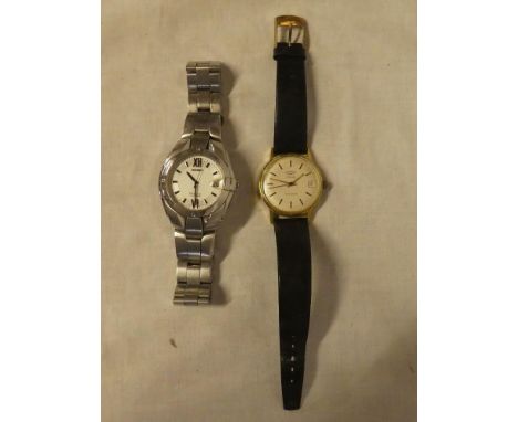 A gentleman's Seiko perpetual calendar wristwatch in stainless steel mounts and a gentleman's gilt Rotary wristwatch (2)