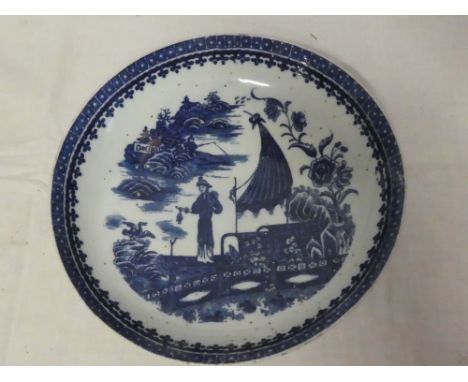 An 18th Century Caughley china shallow bowl with blue and white figure and landscape decoration 8" diameter