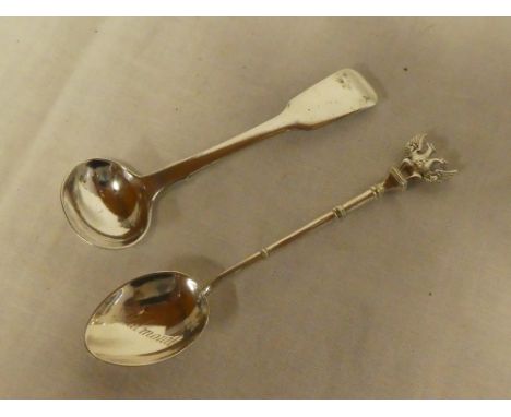 A William IV silver fiddle pattern salt spoon, Exeter marks 1835 and a 1903 Falmouth souvenir silver teaspoon with eagle term