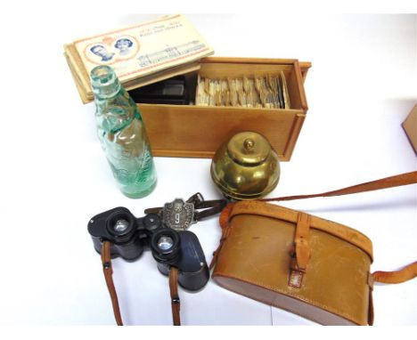 ASSORTED COLLECTABLES comprising a County of Somerset cast metal street trader's licence arm badge, complete with leather str