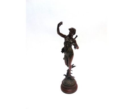A PATINATED SPELTER FIGURE AFTER FERRAND  of a young maiden carrying a mandolin and flower, on wooden socle base, 54cm high