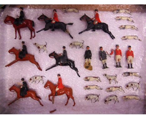 A BRITAINS LEAD HUNTING COLLECTION comprising figures on horseback (7) and foot (4), and assorted hounds (17), variable condi