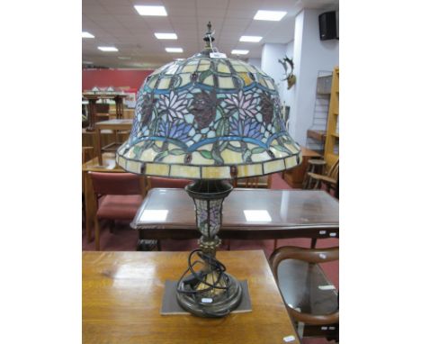 Tiffany Style Table Lamp, with bell shade and gilt lower body, approximately 64cm high.