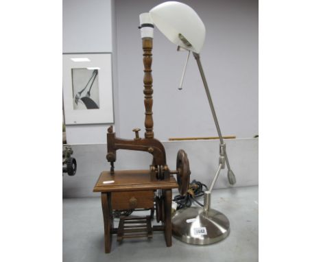 An Unusual Wooden Lamp Modelled as a Treadle Sewing Machine, with working treadle and front drawer, plus a contemporary chrom