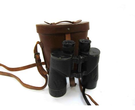 A pair of WWII era binoculars with broad arrow marks and leather case, 1945