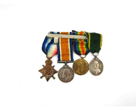 A WWI 1914-15 medal trio named to 1830 PTE. W.S. BROWN NORF. R. and an efficiency medal named to 475044 SJT. G.B. BOWDEN RAMC