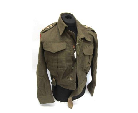 A 1940 pattern captain's battledress blouse (possibly post-war) and trousers, dated 1941