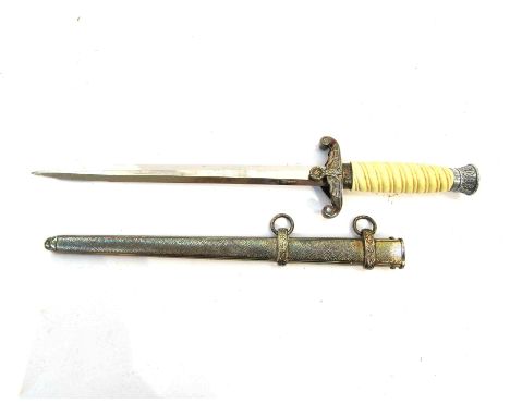 A copy of a German Army dress dagger, no maker's name to blade, cream grip type, with scabbard