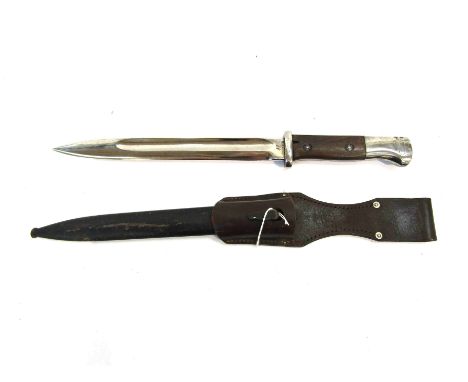 A WWI German Seitengewehr 14 bayonet stamped W17 to blade back, by J.A. Henckels, with scabbard and leather frog dated 1937