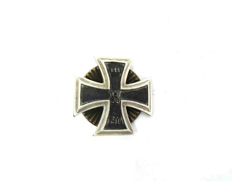 A German screw-back Iron Cross 1st class. Buyer to determine age