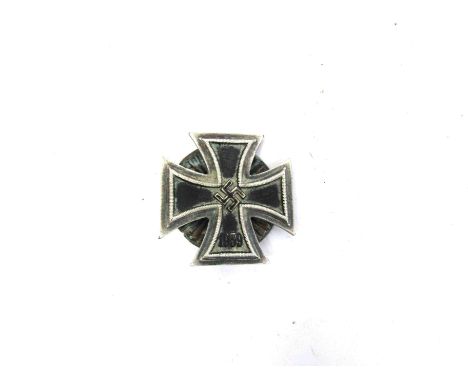 A German screw-back Iron Cross 1st class. Buyer to determine age
