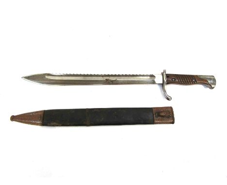 A German 98/05 sawback "Butcher" bayonet, dated W12 to blade back, with signs of engraved lettering to blade, with S98/05 sca