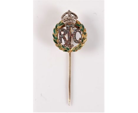 A Royal Flying Corps diamond stick pin: the green enamel wreath set to centre with RFC in small rose cut diamond highlights, 