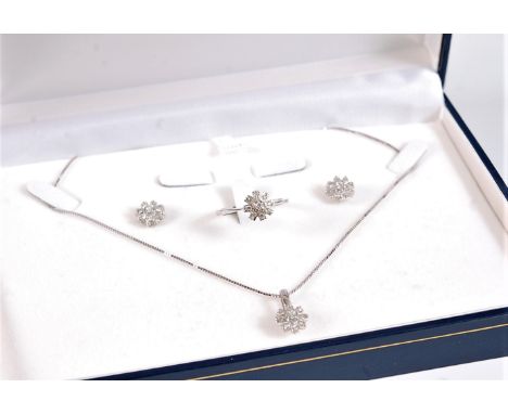 An 18ct white gold and diamond suite, comprising of a ring, earstuds and matching necklace, each composed of a flowerhead clu