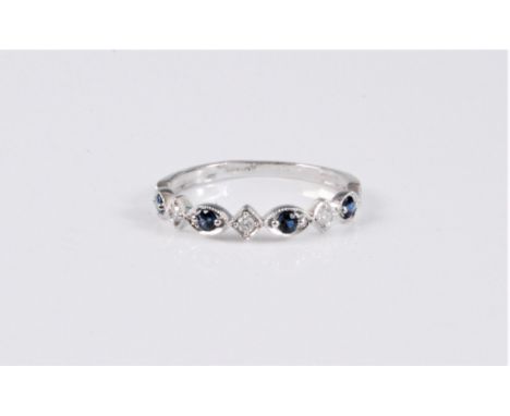 A 9ct sapphire and diamond half hoop eternity ring, the alternating round sapphires and diamonds, in oval and diamond shaped 