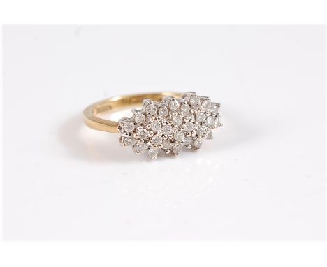 An 18ct oval diamond cluster ring, the oval cluster set with round brilliant cut diamonds, total estimated approx. 0.50cts, s