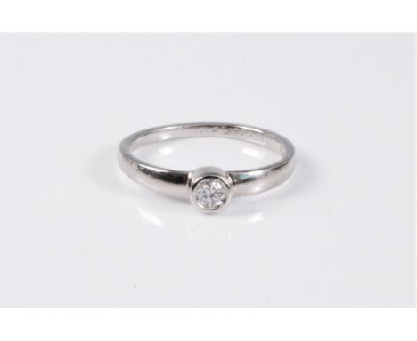 A platinum diamond solitaire ring, the round brilliant cut diamond, estimated approx. 0.10cts, collet mounted in platinum wit