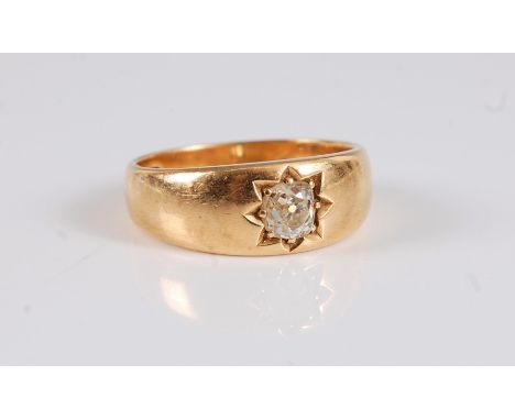 A single stone diamond ring, the old cut diamond, estimated approx. 0.54cts, gypsy set to a plain tapered band stamped 18, si