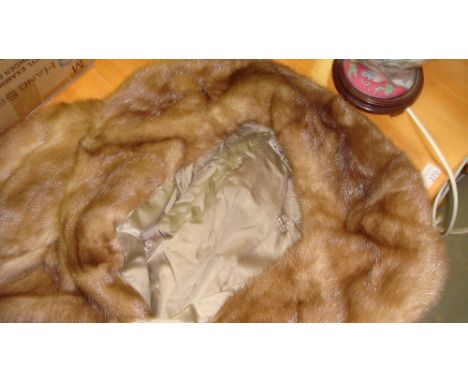 Vintage fur coat with floral silk lining