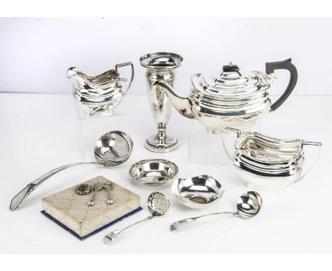 A collection of silver and silver plate, including a damaged silver filled vase, a silver sauce ladle and sugar sifter spoon,