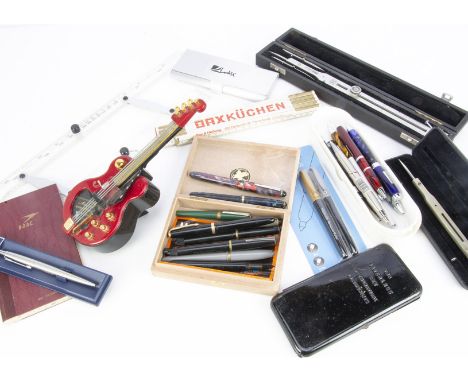 A collection of vintage and modern pens and drawing equipment, including nine vintage fountain pens, such as a Wyvern 660, a 