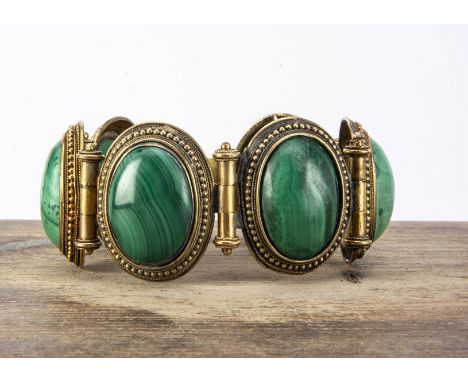 An Italian 19th Century Castellani malachite archaeological revivalist bracelet, the six oval malachite polished pebbles with