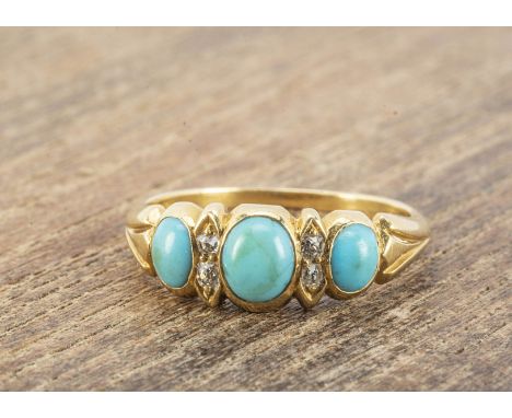 An 18ct gold turquoise and old cut diamond dress ring, the three oval cabochon turquoise stones alternately set with pairs of