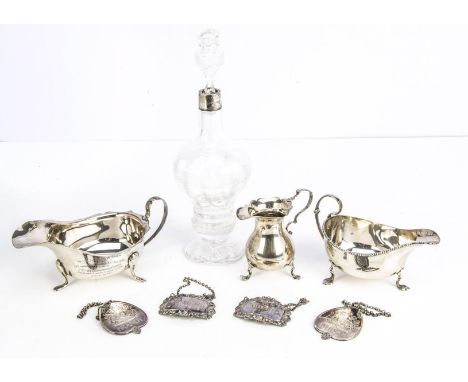 A small group of silver and other items, including two silver sauce boats, one with presentation engraving, a silver Georgian