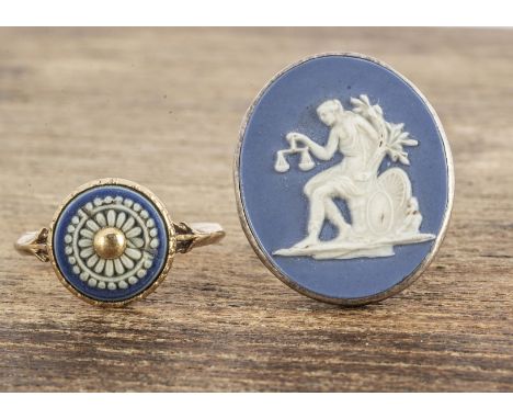 An early 19th Century Jasper style white metal mounted signet ring, depicting the classical figure Justice seated with scales