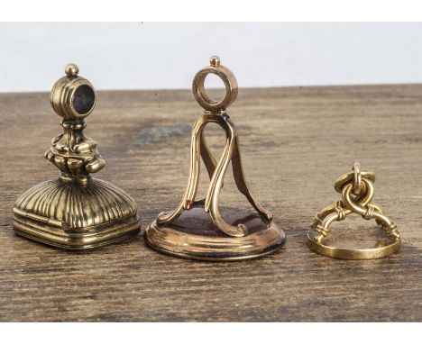 Three 19th Century fob seals, comprising an intaglio carved carnelian Georgian example, with family crest, 3.3cm x 2.3cm, tog