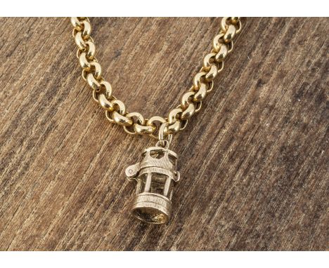 A 9ct gold circular linked chain, with snap clasp and associated charm pendant of a miners lamp in 9ct gold, 45.5cm, 18g 