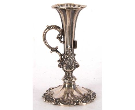 Victorian silver chamber stick having fluted stem with carrying scroll side handle, decorated with leaves, scrolls etc to a l