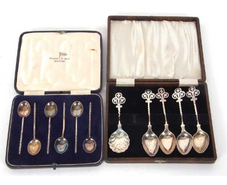 Mixed Lot:  A cased set of four Victorian silver teaspoons with twisted stems and pierced leaf trefoil finials, Sheffield 188