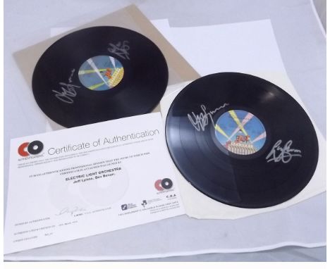 Two Electric Light Orchestra sigd LPs: OUT OF THE BLUE, 1977, 33 1/3rpm and DISCOVERY, 1979, 33 1/3rpm, each sigd by both Jef