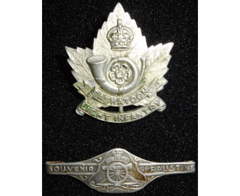 WW I Canadian badge. Saskatoon Light Infantry. 37 x 34mm. Also silver R.A. Souvenir of Palestine stick clasp. Circa 1947.    