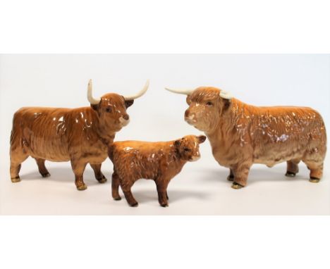 Three Beswick figures: Highland Bull, no. 2008, 12.7cm high; Highland Cow, no. 1740, 13.3cm high and Highland Calf, no. 1827D