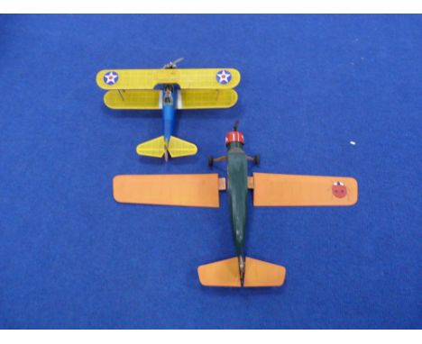 Two small scale model planes, both with petrol engines. Green &amp; orange 'LadyBird' No4 L67cm, wingspan 106cm, the other ye