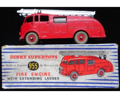 Dinky. 955 Fire engine. No windows. Average to Good. Boxed. 651 Centurion tank. Metal rollers. Average to Good. Both boxed.