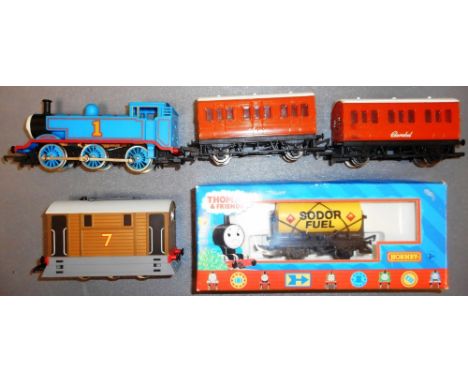 Hornby. Thomas the Tank Engine. No. 1 loco, No. 7 loco, coaches Clarabel and Annie, Sodor Fuel tanker.