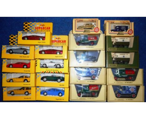 Seventeen various die-cast vehicles. Maisto, Matchbox, Lledo. All boxed.