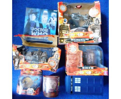 Dr. Who. Eight various figures and collector's plate. Mostly boxed or packaged.
