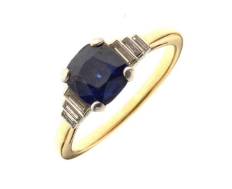 Sapphire and diamond ring, unmarked, the square mixed cut sapphire, 7.1mm x 6.8mm x 3.7mm deep, with a trio of graduated bagu