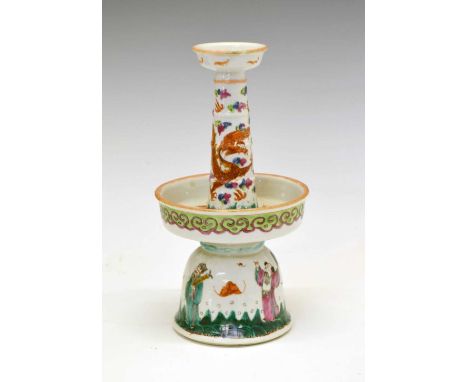 Chinese Canton Famille Rose porcelain candlestick, 20th Century, with ribbed tall stem on bell-shaped base, decorated with a 